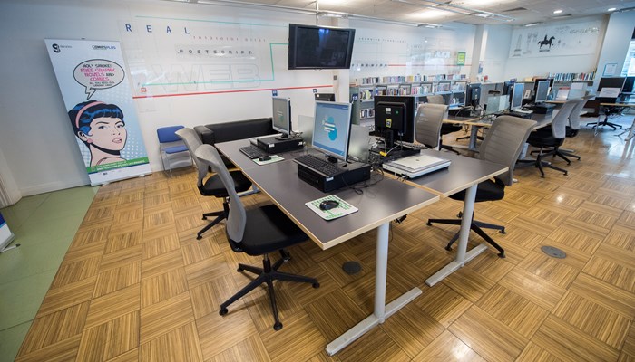 An area with PCs for public use in a library.