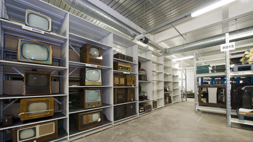 Display of old televisions, phones and radios in Technology pod