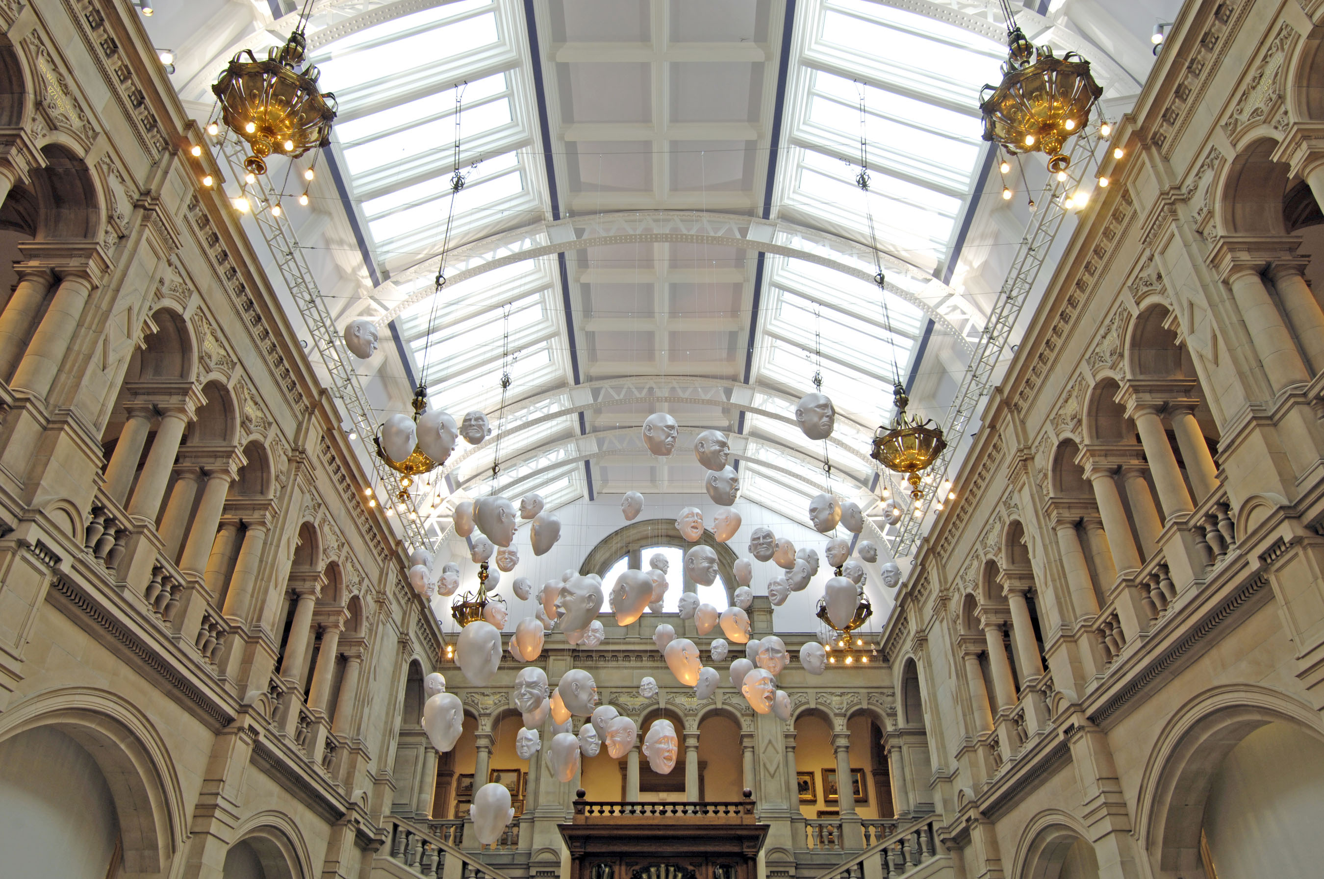 Floating heads at Kelvingrove Art Gallery and Museum - each head has a different expression. 