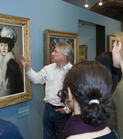 Students with lecturer viewing J D Fergusson - Hat With Bird: Anne Estelle Rice