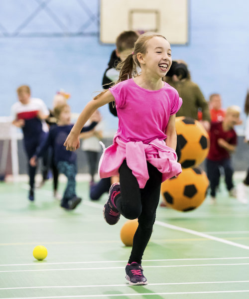 A group of children taking part in an activity class at school