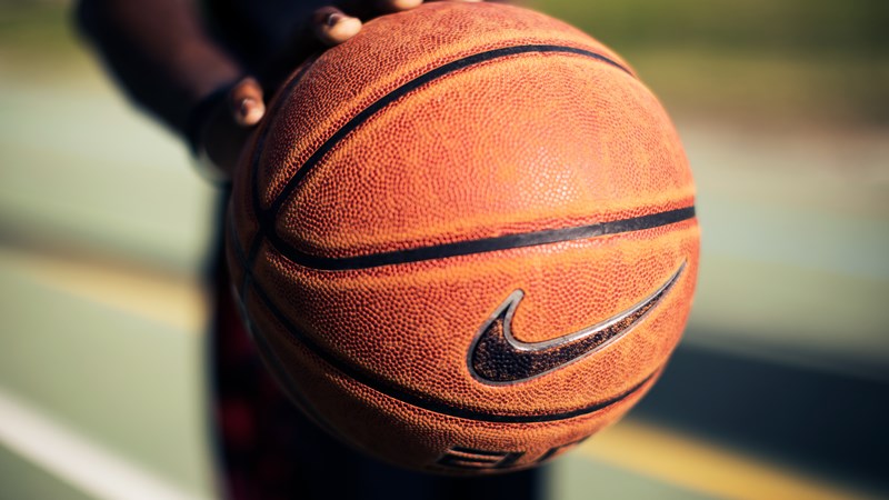 close up of orange basketball with Nike tick 
