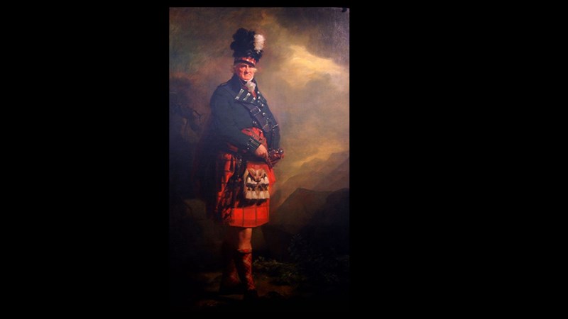 Photograph showing a painting. A romanticised portrait, Francis MacNab, twelfth Laird of MacNab, appears full-length in an impressive interpretation of Highland dress.