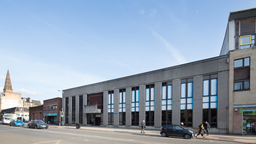 An external photograph of Hillhead Library, a 70s style concrete building.