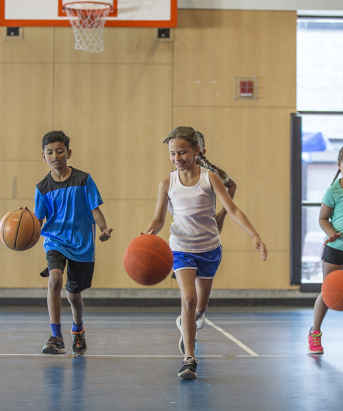 children playing basketball