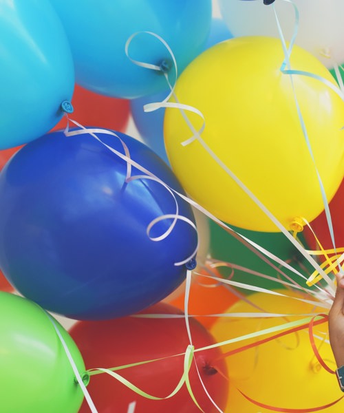 a bunch of colourful balloons