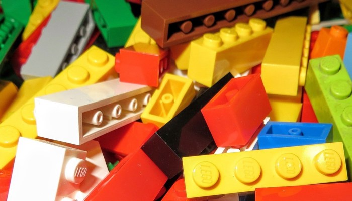 A close up of Lego blocks in a selection of colours