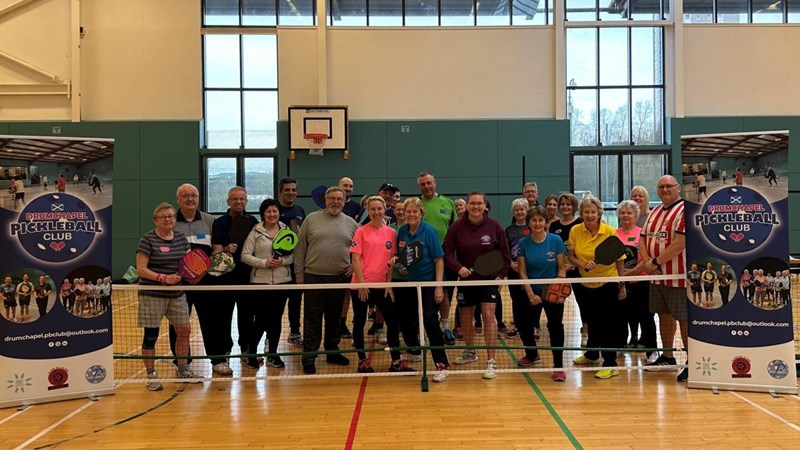 A group of people at Drumchapel after playing pickleball
