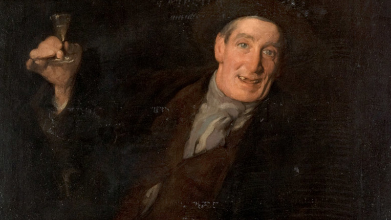 Man from 1800s holding cigar pipe
