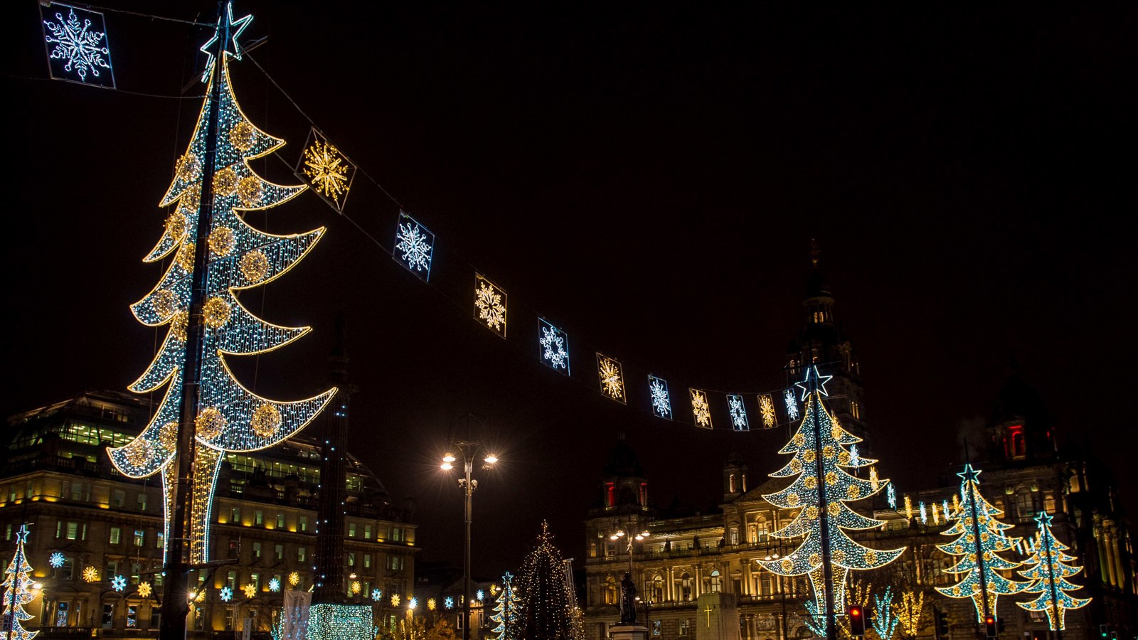 Christmas tree and snowflake Christmas lights in George Square, Glasgow.
