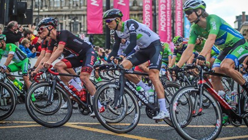 Professional cyclists racing around George Square