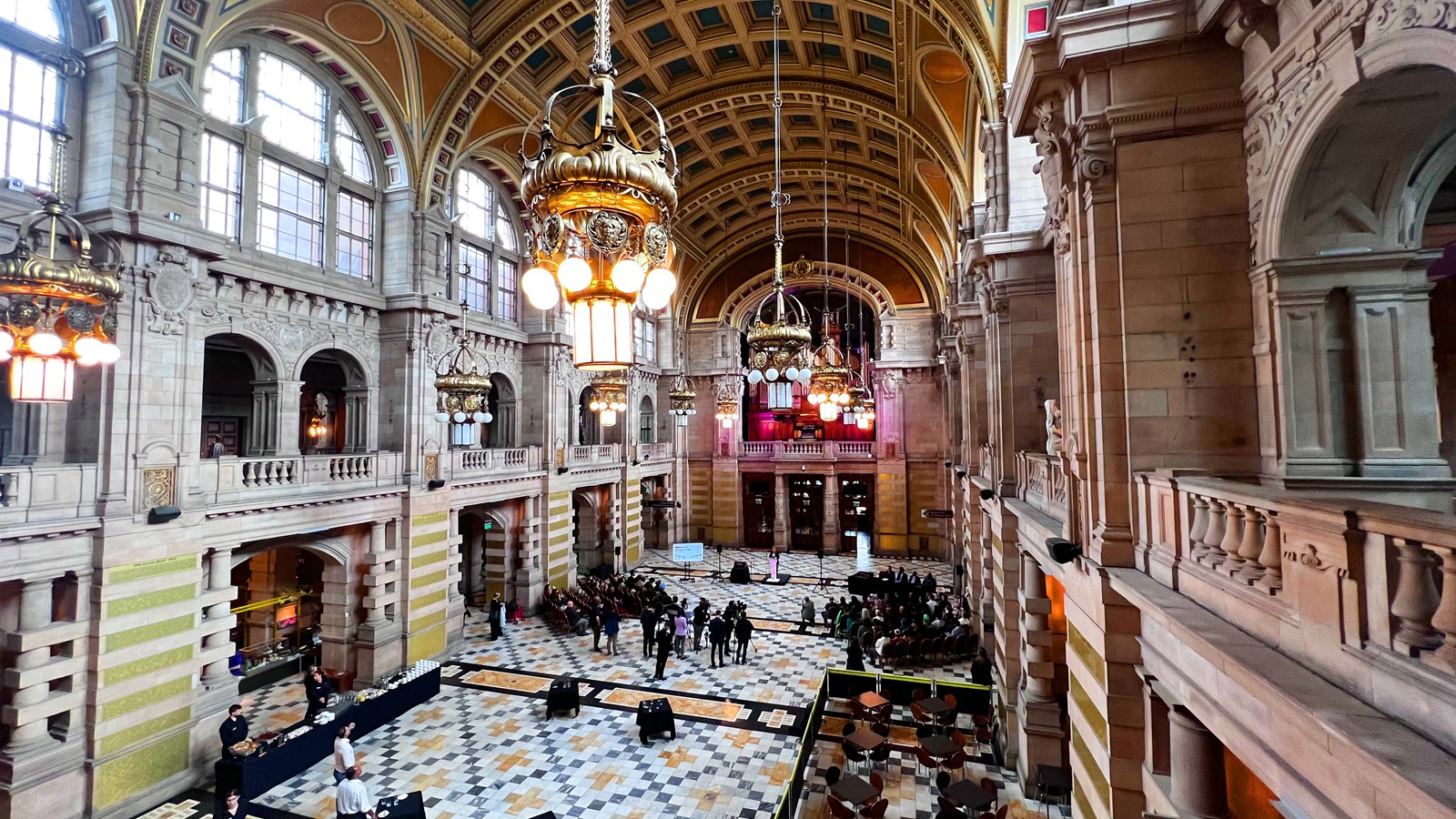 Photograph of a view of the inside of Kelvingrove Art Gallery and Museum showing the foyer, the cafe and the organ