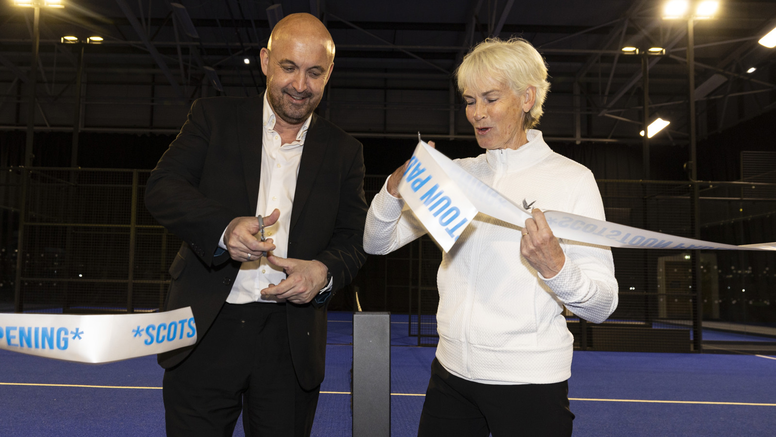 George Hunter and Judy Murray cutting a ribbon at the opening of a new indoor padel court