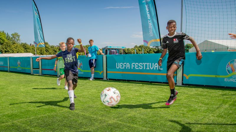 Young people playing football