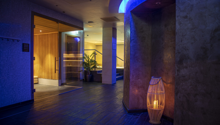 The interior of Refresh Spa in Glasgow, with dim lighting, plunge pool, sauna and steam room.