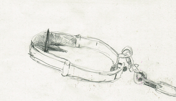 A line drawing with shading in graphite pencil of a set of branks - or witches or scolds bridle - these were instruments of torture and the drawer has tried to focus on the spike used to hold the tongue down to stop the wearer from speaking.