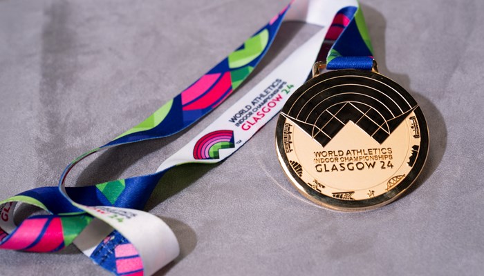 A gold medal with the inscription 'World Athletics Indoor Championships Glasgow 24'