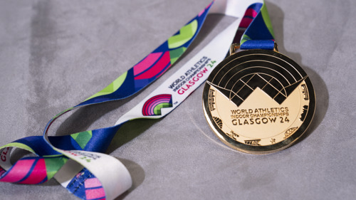 A gold medal with the inscription 'World Athletics Indoor Championships Glasgow 24'