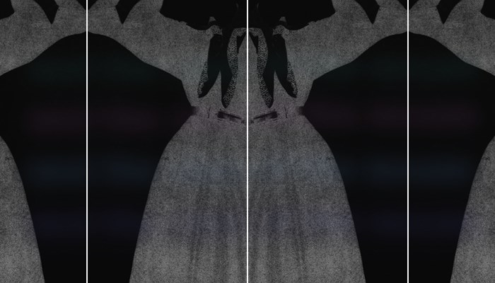 A ghostly repeat image of a Victorian dress