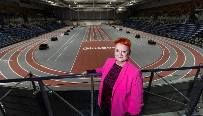 Bailie Annette Christie in the stands in front of the indoor athletics track at the Emirates Arena in Glasgow.