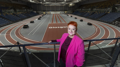 Bailie Annette Christie in the stands in front of the indoor athletics track at the Emirates Arena in Glasgow.