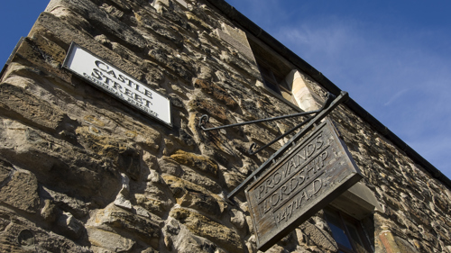 Photograph showing the front elevation and entrance sign of Provand's Lordship taken from Castle Street.