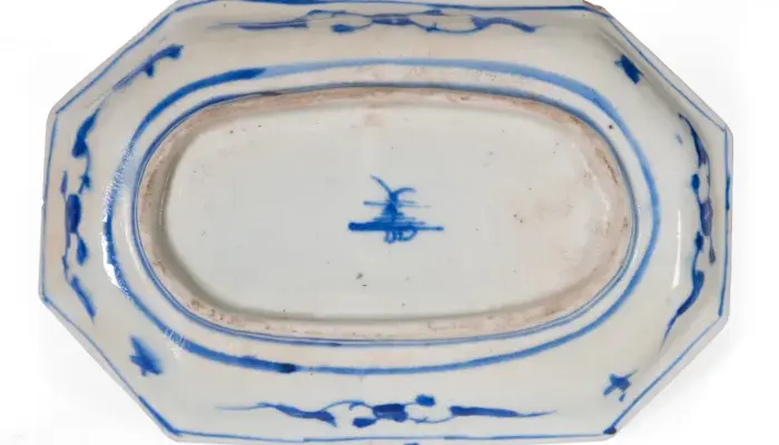 photograph of an oblong plate with cobalt blue design.