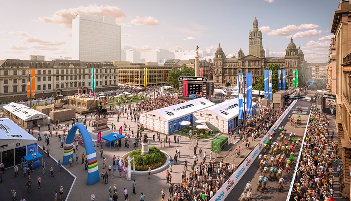 An artist's impression of how George Square will look during the 2023 UCI Cycling World Championships. Cyclists race along a street on the right of the image as spectators watch. There is also a fan zone and stage in the centre.