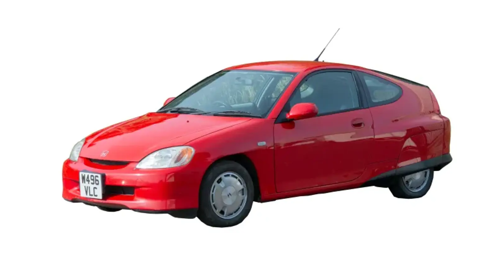 photograph of a small red Honda car.