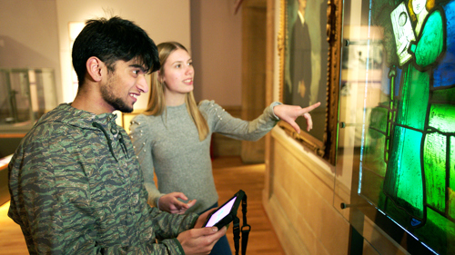 Photograph showing young people using My Stories in Kelvingrove Museum and Art Gallery