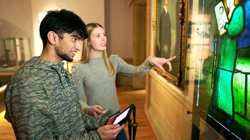 Photograph showing young people using My Stories in Kelvingrove Museum and Art Gallery