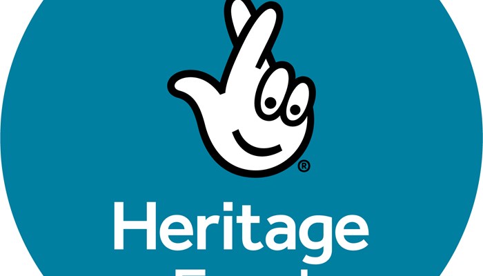 Blue Heritage Fund logo with crossed fingers