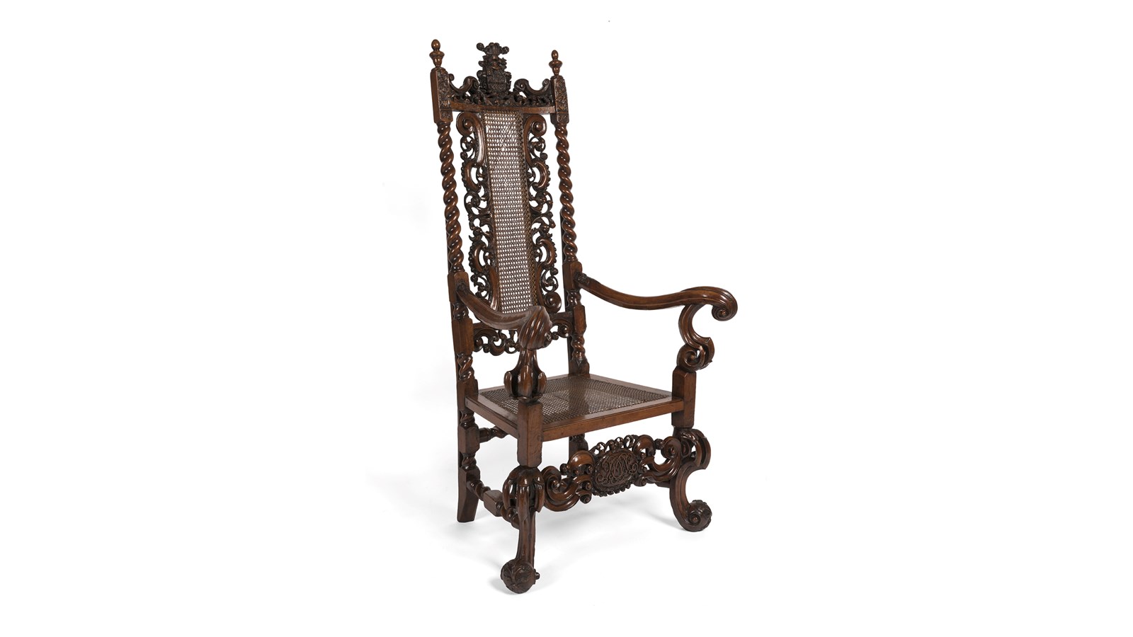 an ornately carved dark wood chair