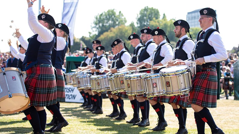 marching pipe band in formation side view