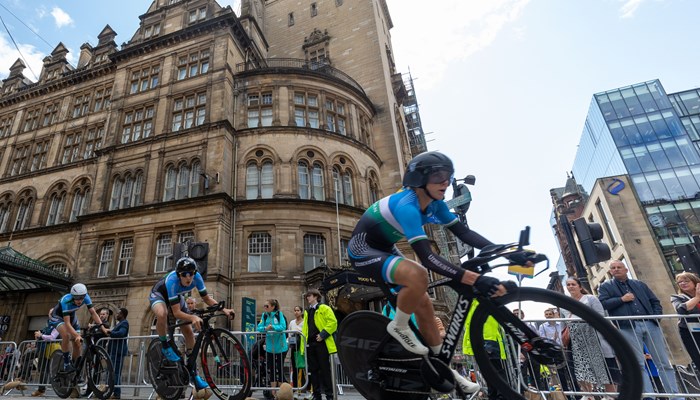 Cyclists in the Merchant City in Glasgow during the road race event at the 2023 UCI World Cycling Championships.