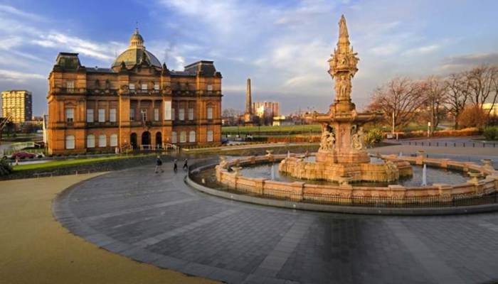 Peoples palace and fountain set against a blue winter sky