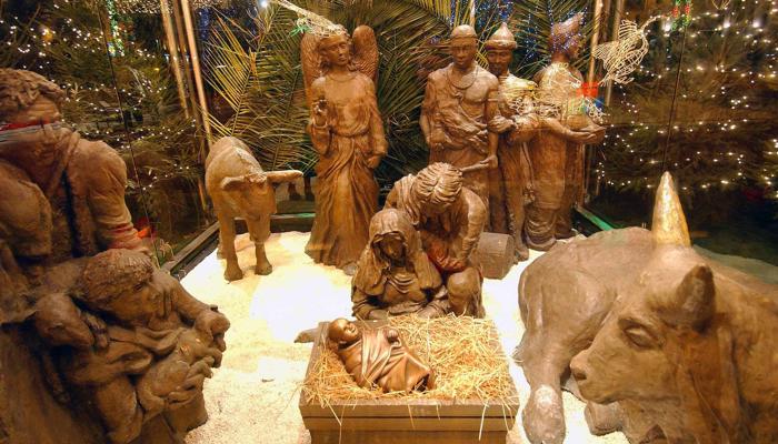 traditional wooden nativity scene with baby Jesus 