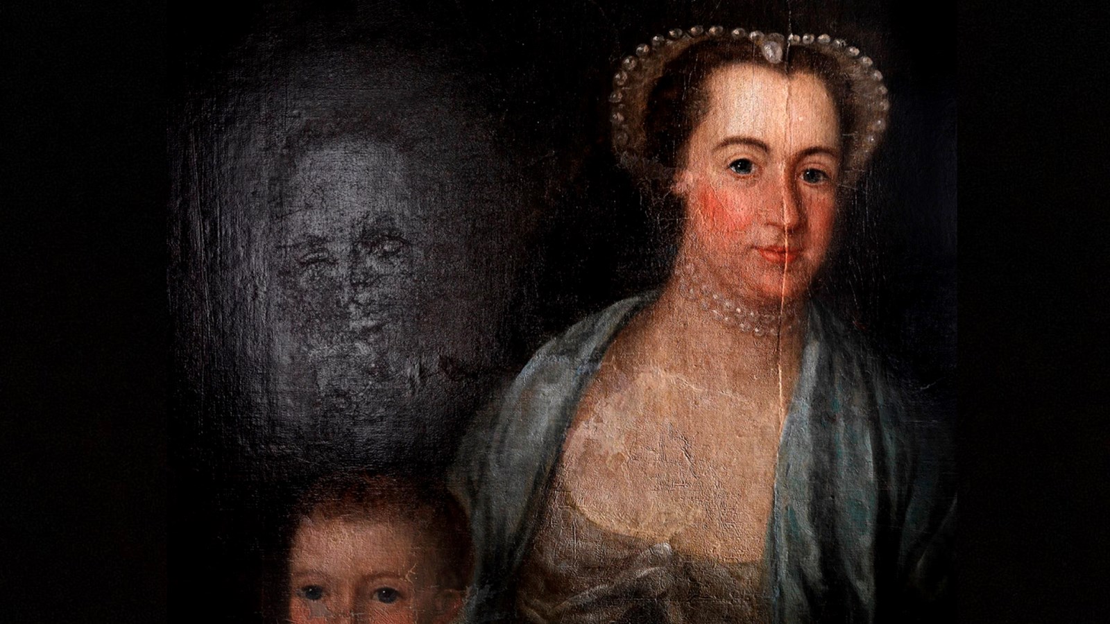 a close up on the Glassford's family portrait showing the person who has been painted over 