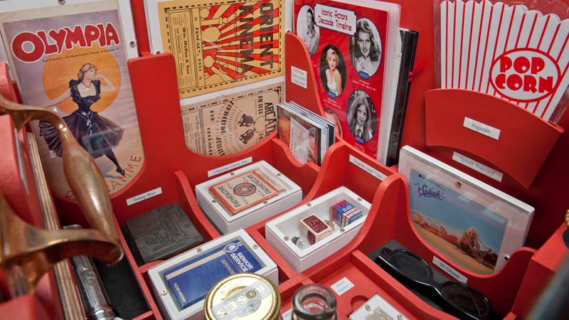 Photograph showing an example of one of The Open Museum's Handling Kits. This is about cinema memorabilia.
