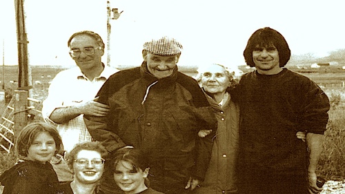 Family photograph of Angus with three adults and three younger children