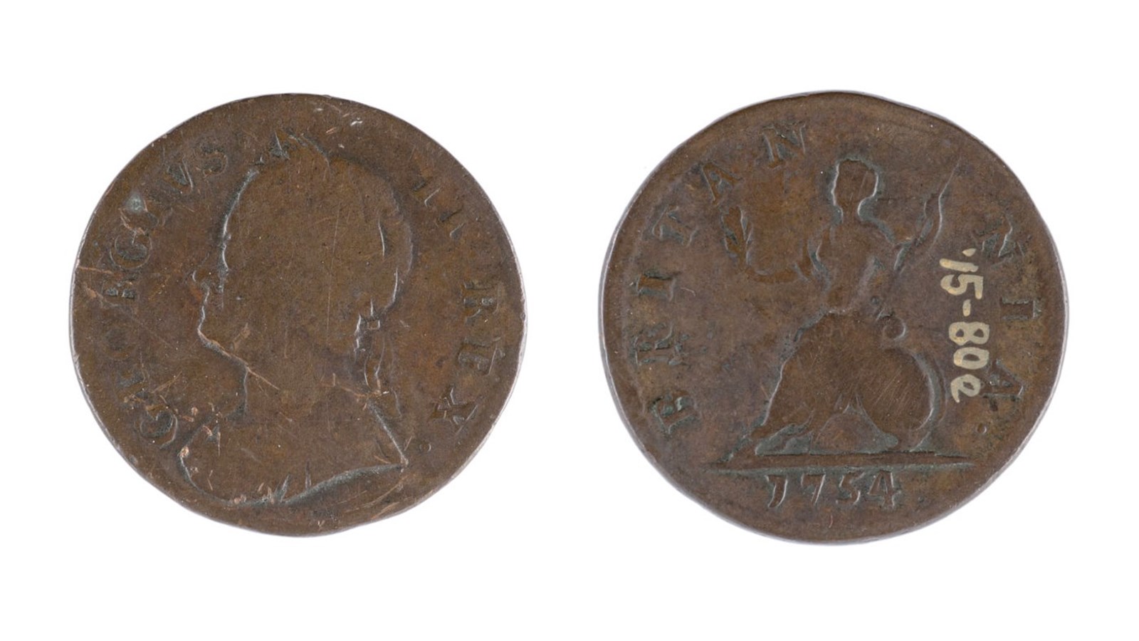 the front and back sides of a brown coin showing a low relief of a persons head on either side.