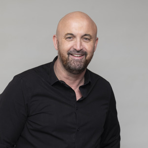 A headshot of George Hunter